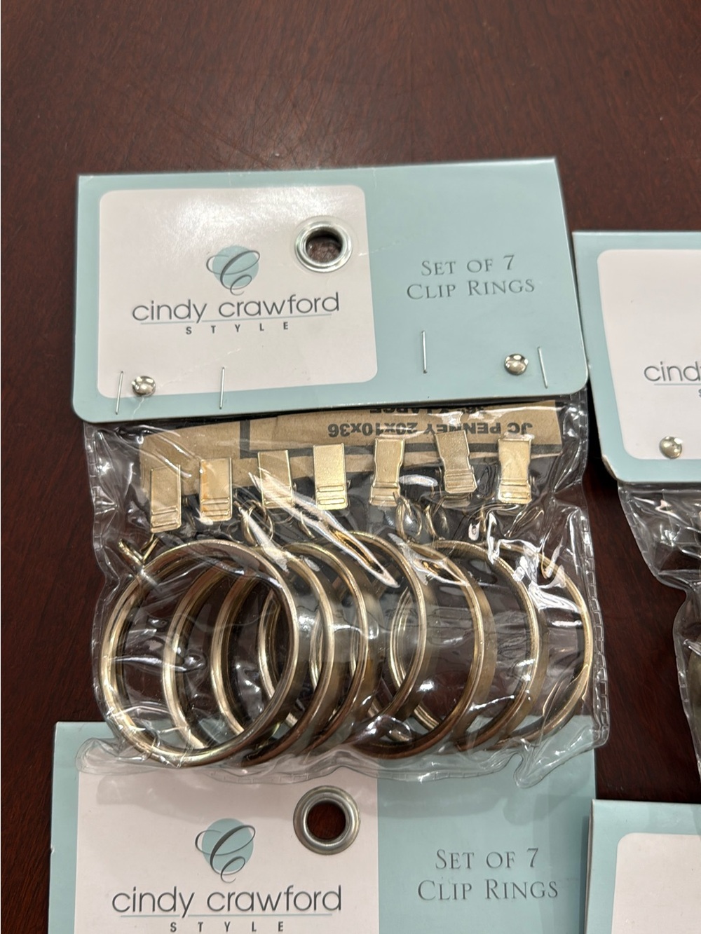 Cindy Crawford Style Set of 7 Gold Clip Rings for curtains